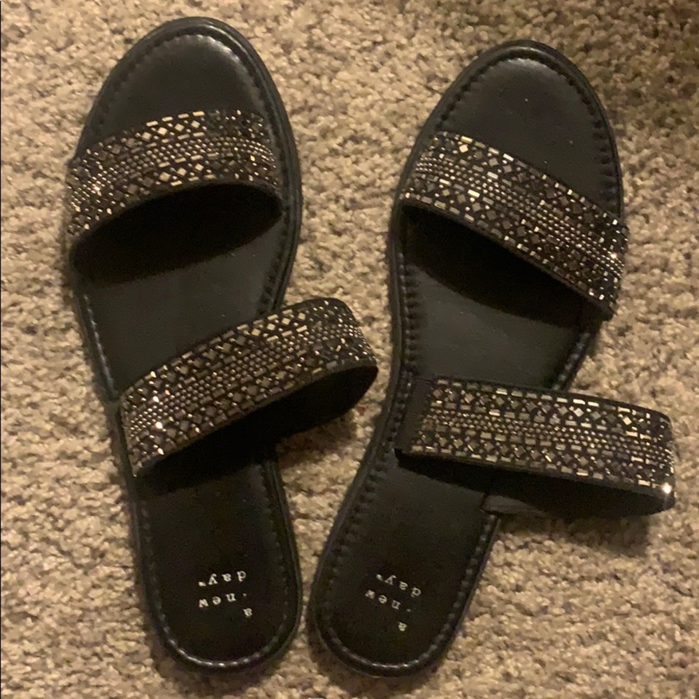 Black slip on sandals